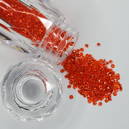 Orange Pixie Dust Rhinestones are high-quality glass SS2 Rhinestones. Orange Pixie dust is perfect for rhinestone nail art