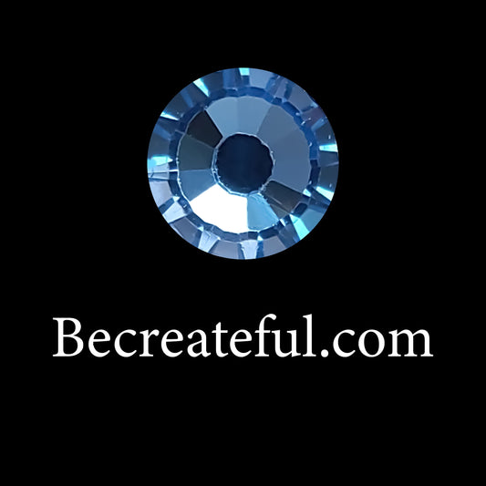 DMC Lt. Sapphire Glass Hotfix Rhinestones - Be Createful, Beautiful Rhinestones at wholesale prices.