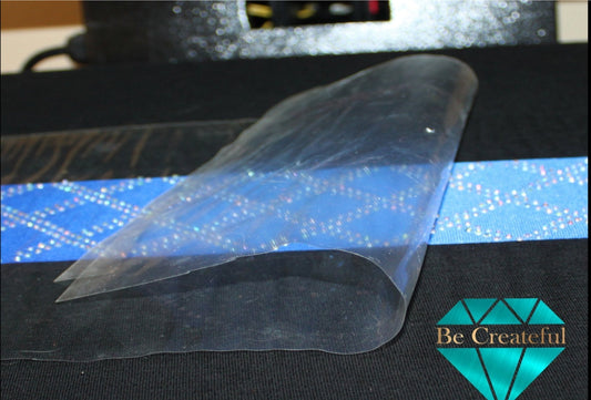 Heat pressing hotfix rhinestones using transfer tape