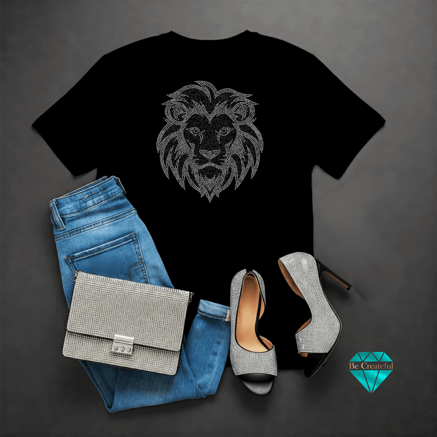 Black t-shirt with lion design, blue jeans, silver handbag, and high heels on a dark gray background.