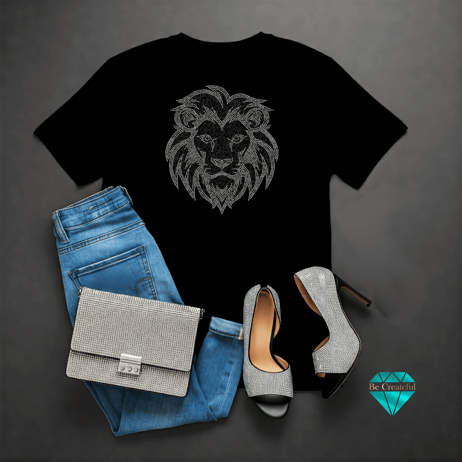 Black t-shirt with lion design, blue jeans, silver handbag, and high heels on a dark gray background.