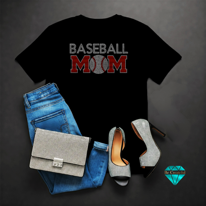 Black t-shirt with 'Baseball Mom' design, blue jeans, silver purse on a dark background.