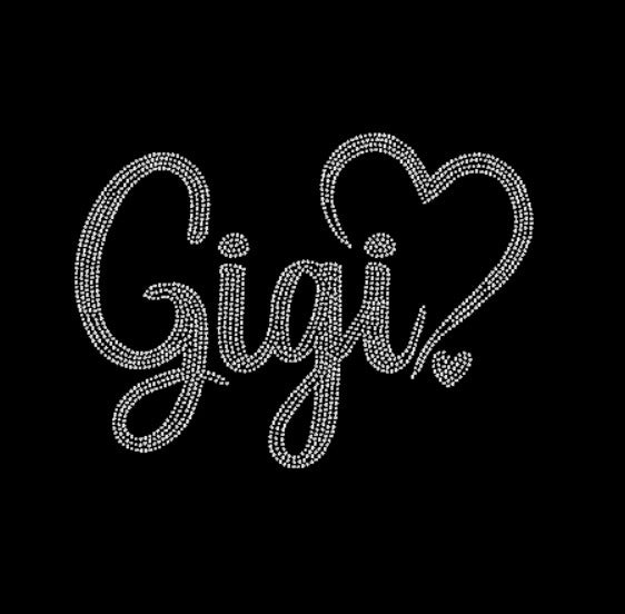 Black rhinestone t-shirt with 'Gigi' and heart design,  on a dark background.