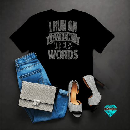 Black t-shirt with text, blue jeans, and high heels on a dark background