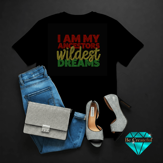 I am my ancestors wildest dreams rhinestone design on a lBlack t-shirt  blue jeans, silver handbag, and high heels on a dark backgroud