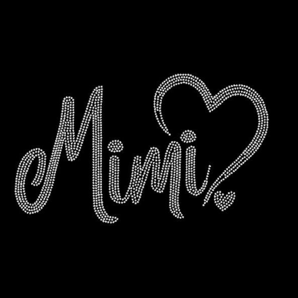 Mimi with heart rhinestone design on black shirt.