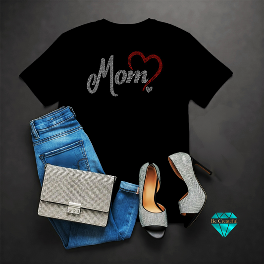 Black t-shirt with 'Mom' rhinestone design, blue jeans. Perfect for Mother's Day!
