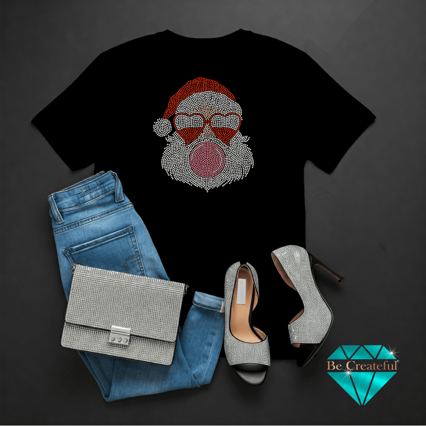 Black t-shirt with Santa and Bubble Gum graphic, blue jeans, silver handbag, and high heels on a dark background.