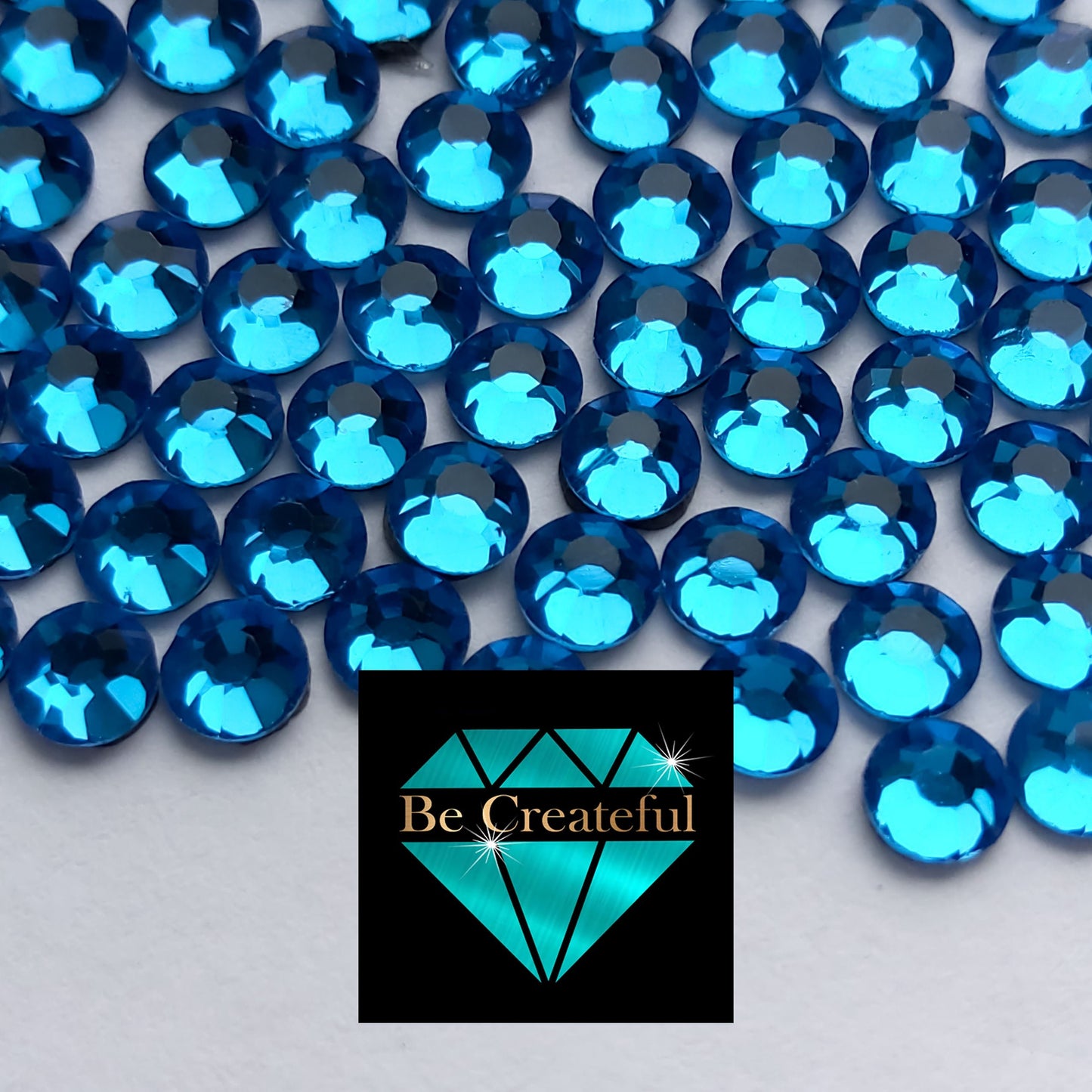 DMC Capri Blue Glass Hotfix Rhinestones - Be Createful, Beautiful Rhinestones at wholesale prices.