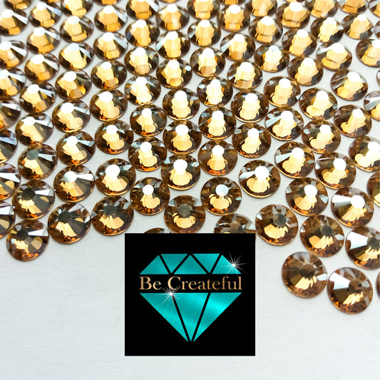 LUXE® Champagne Hotfix Rhinestones are high-quality 16 facet glass Rhinestone that provides intense sparkle and refraction.